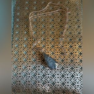 Kendra Scott long Carole Necklace in Gray Illusion and rose gold.